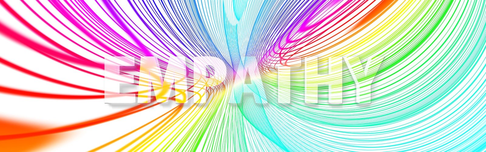 Digital artwork featuring a vibrant, multicolored abstract swirl pattern with the word 'EMPATHY' in bold, capitalized letters at the center. The background has a white gradient that fades into the swirls of red, pink, orange, yellow, green, blue, and purple, creating a visual effect of dynamic movement and energy.